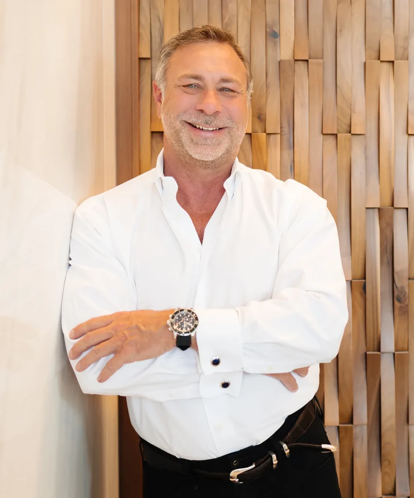Jeff Green, Houston financial advisor and CEO of Winstone Wealth Partners, smiling in office portrait